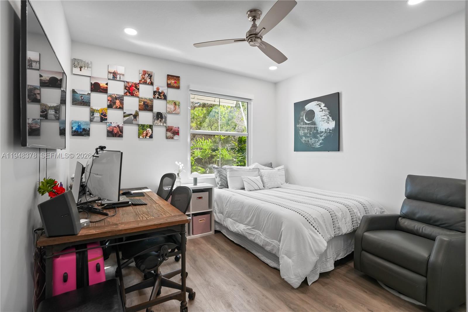 2913 Cascada Isle Way Cooper City, FL 33024 - Photo 27 of 50 a bedroom with a bed and a couch