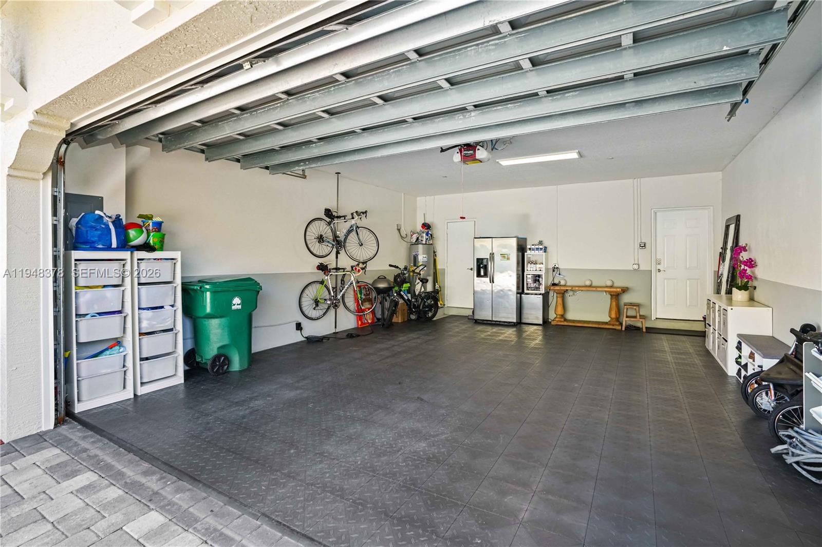 2913 Cascada Isle Way Cooper City, FL 33024 - Photo 38 of 50 a view of a garage with storage
