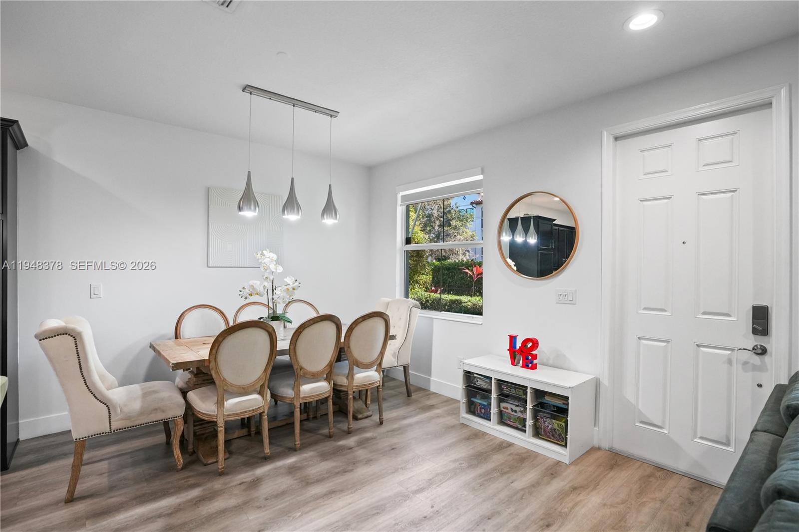 2913 Cascada Isle Way Cooper City, FL 33024 - Photo 8 of 50 a living room with furniture and a wooden floor