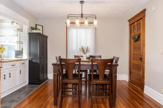 a spacious bathroom with a granite countertop sink a mirror and a