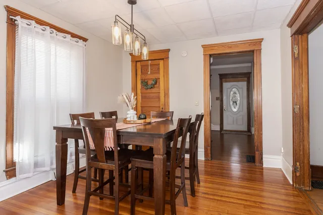 a kitchen with a refrigerator and a more cabinets