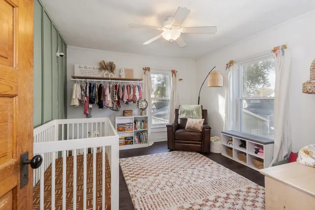 a front view of house with yard and outdoor seating