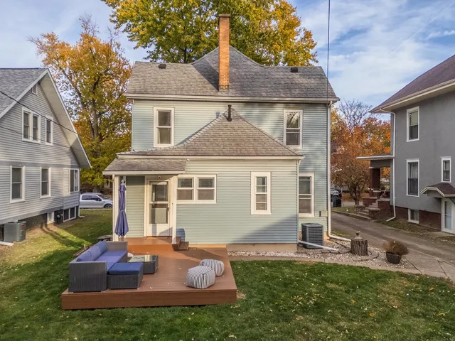 a outdoor living space with furniture and a window