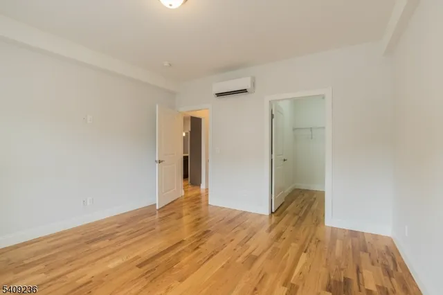 a view of wooden floor in an empty room