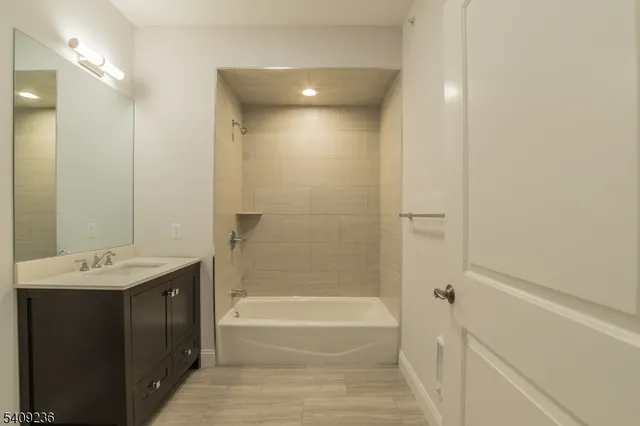 a view of a car park in front of house