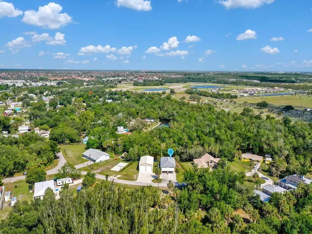 a view of a city with lots of trees