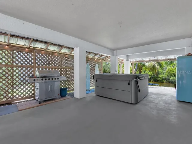 a living room with a couch and a large window