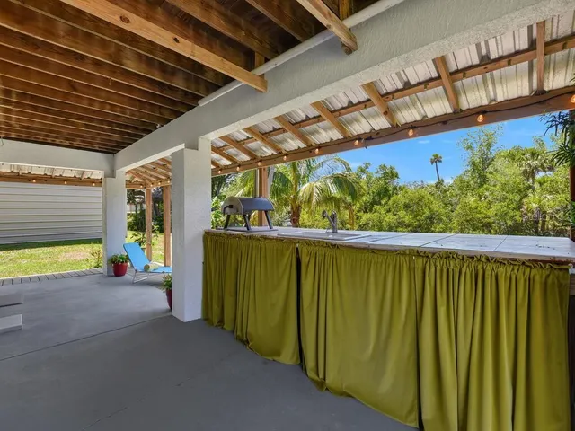 a view of a swimming pool with a patio