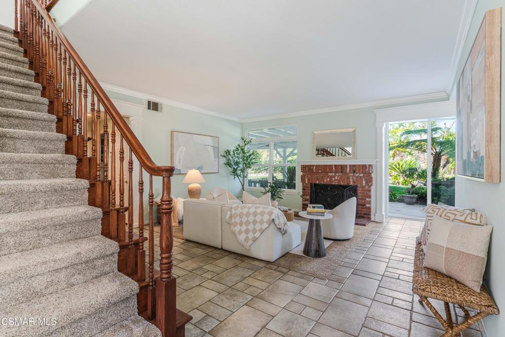 637 Bluegrass Street Simi Valley, CA 93065 - Photo 14 of 67 a view of a livingroom with furniture and a fireplace