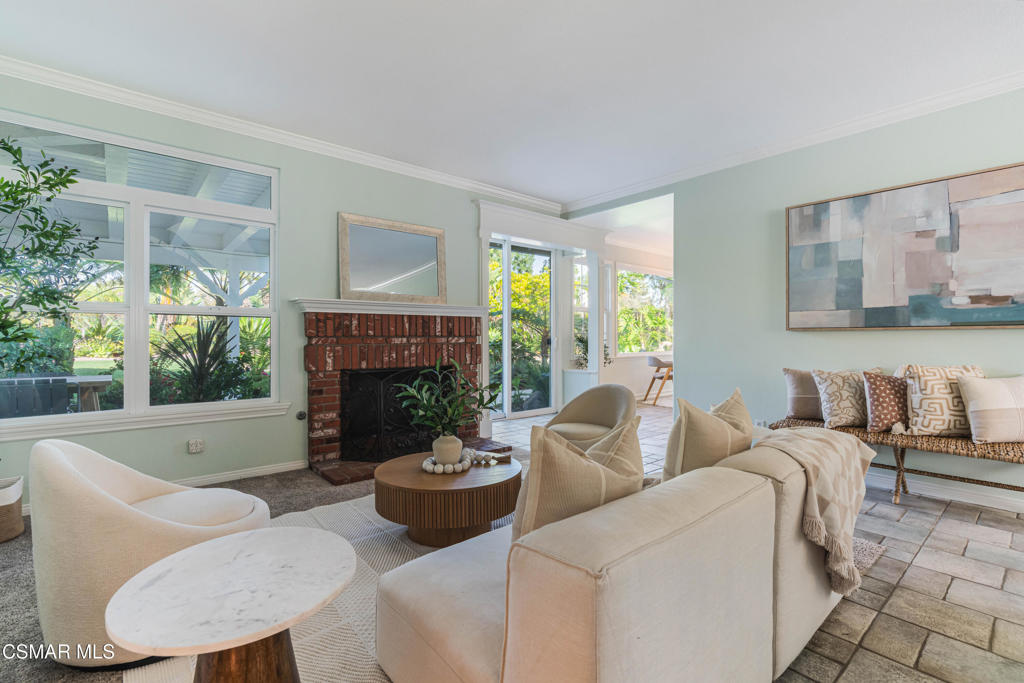637 Bluegrass Street Simi Valley, CA 93065 - Photo 16 of 67 a living room with furniture and a fireplace