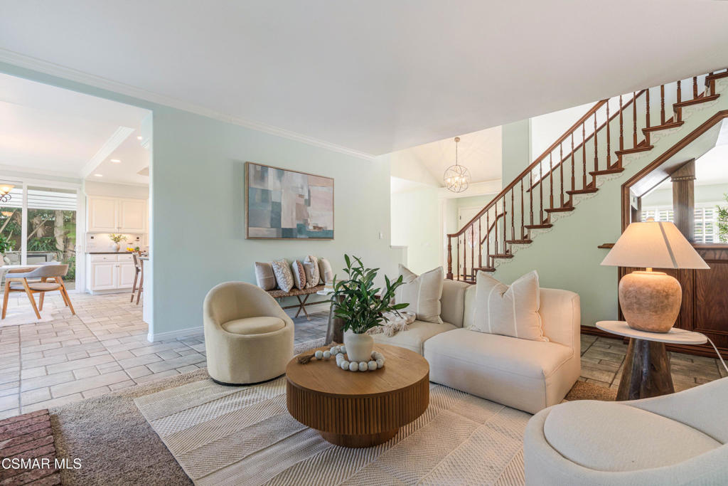 637 Bluegrass Street Simi Valley, CA 93065 - Photo 18 of 67 a living room with furniture and a potted plant