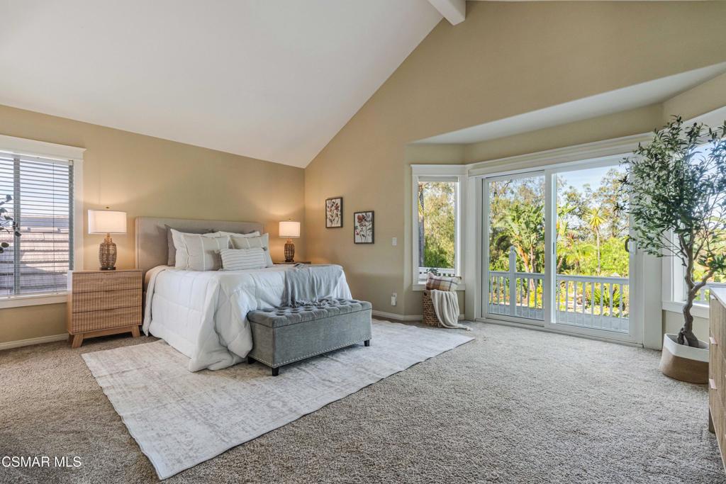 637 Bluegrass Street Simi Valley, CA 93065 - Photo 39 of 67 a spacious bedroom with a bed and a large window