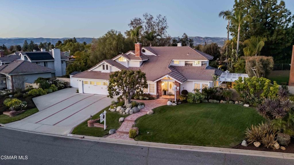 637 Bluegrass Street Simi Valley, CA 93065 - Photo 4 of 67 an aerial view of multiple houses with a yard
