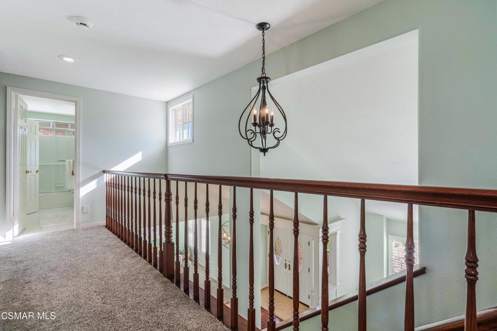 637 Bluegrass Street Simi Valley, CA 93065 - Photo 44 of 67 a view of a hallway with window