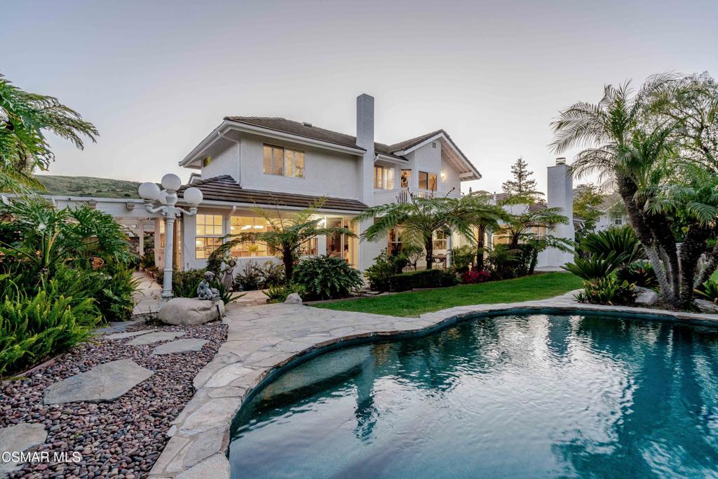 637 Bluegrass Street Simi Valley, CA 93065 - Photo 57 of 67 a front view of a house with a yard