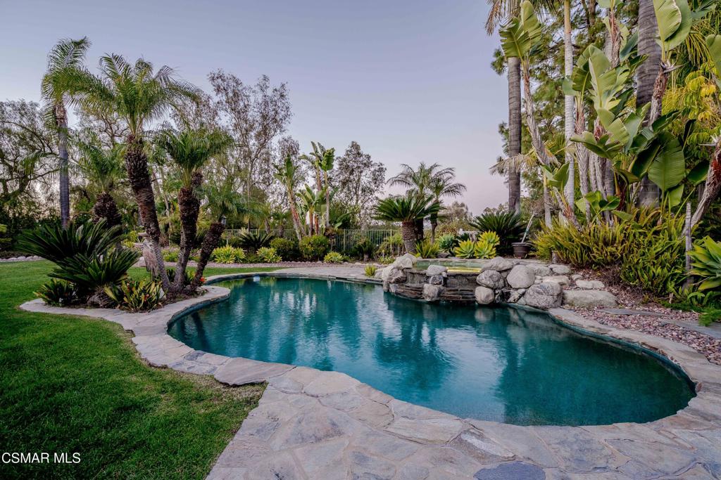 637 Bluegrass Street Simi Valley, CA 93065 - Photo 58 of 67 a view of a lake with a yard