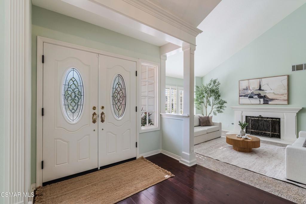 637 Bluegrass Street Simi Valley, CA 93065 - Photo 8 of 67 a view of a livingroom with furniture and a fireplace