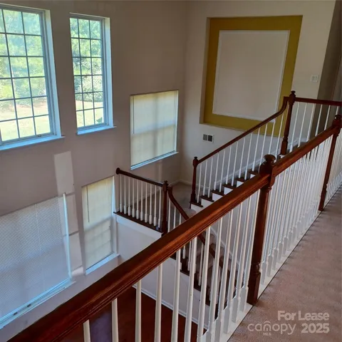 a bathroom with a sink toilet and mirror