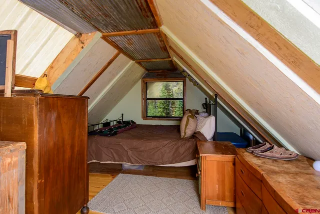 a view of a chairs and table in patio
