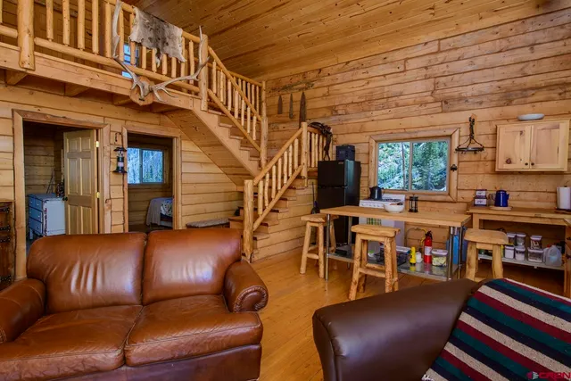 a view of a dining table and chairs in the kitchen