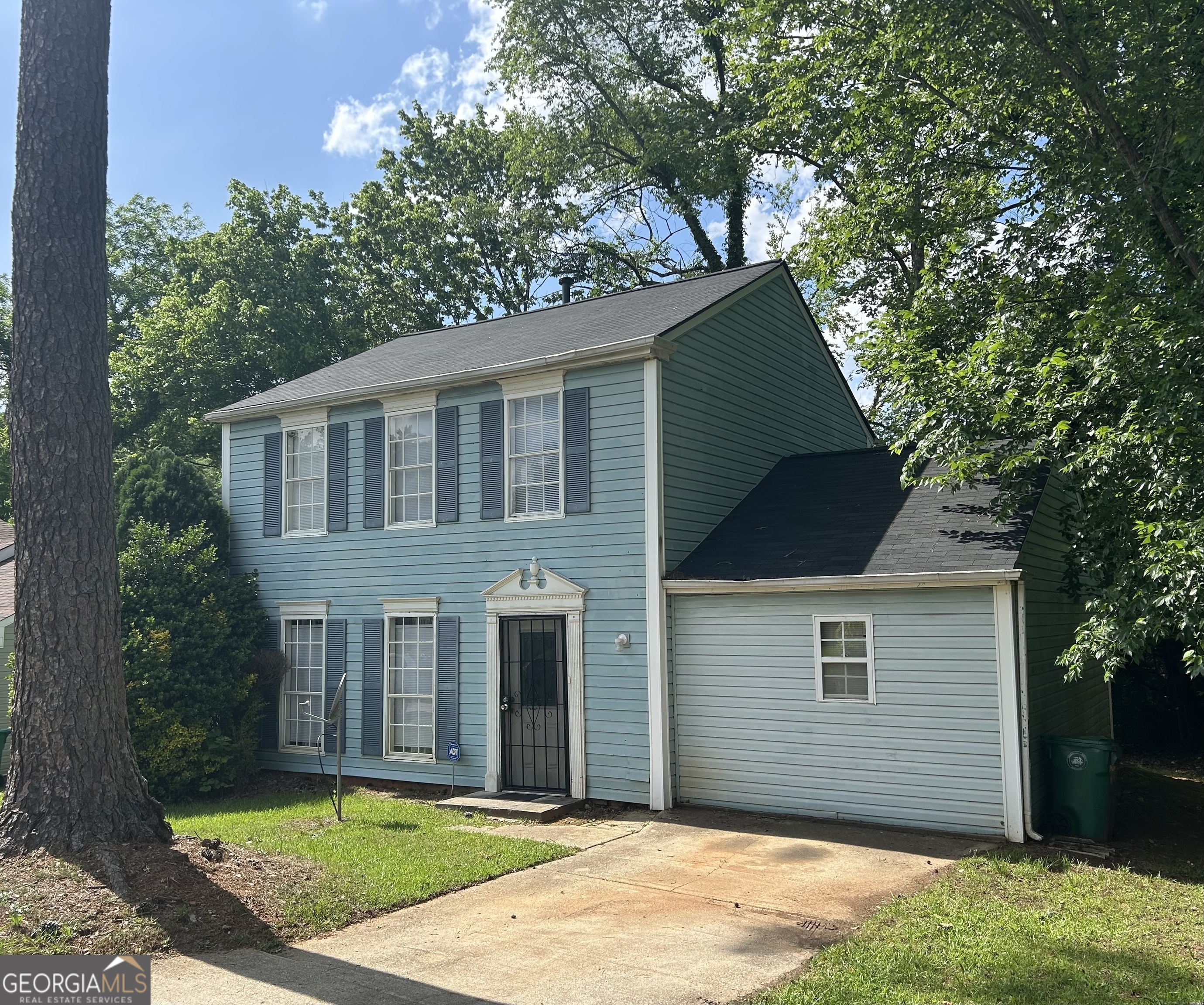 4981 Millstone Walk Stone Mountain, GA 30088 - Photo 1 of 1 a view of a house with a backyard