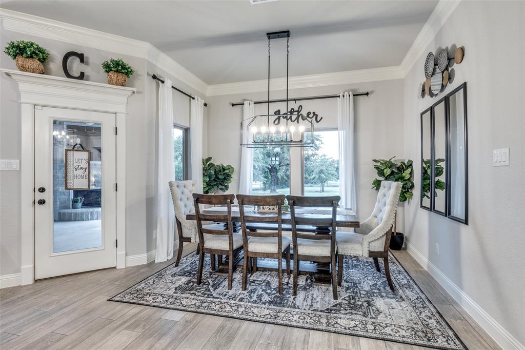 109 Highland Ranch Drive Paradise, TX 76073 - Photo 12 of 33 a view of a dining room with furniture window and wooden floor