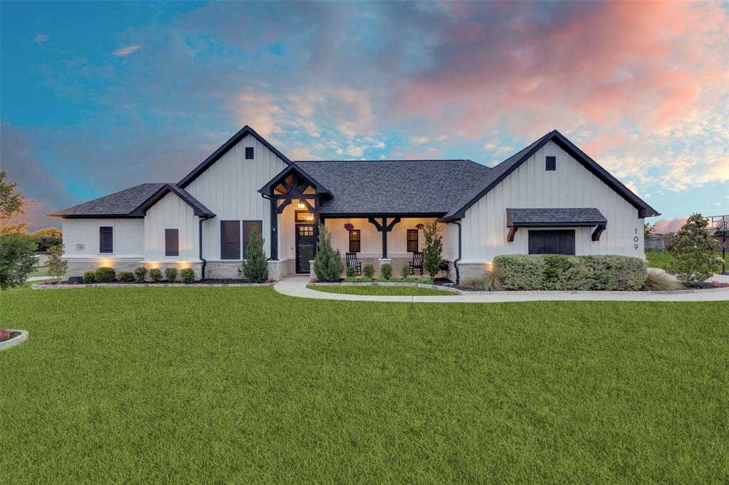 109 Highland Ranch Drive Paradise, TX 76073 - Photo 31 of 33 a front view of house with yard and green space
