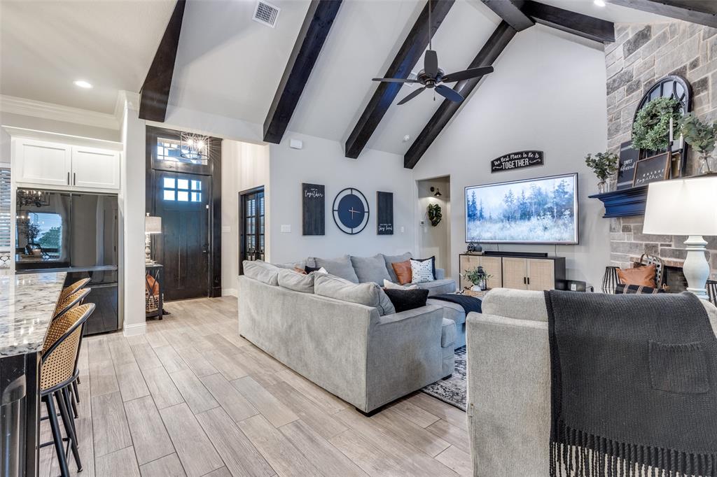 109 Highland Ranch Drive Paradise, TX 76073 - Photo 7 of 33 a living room with furniture and a flat screen tv