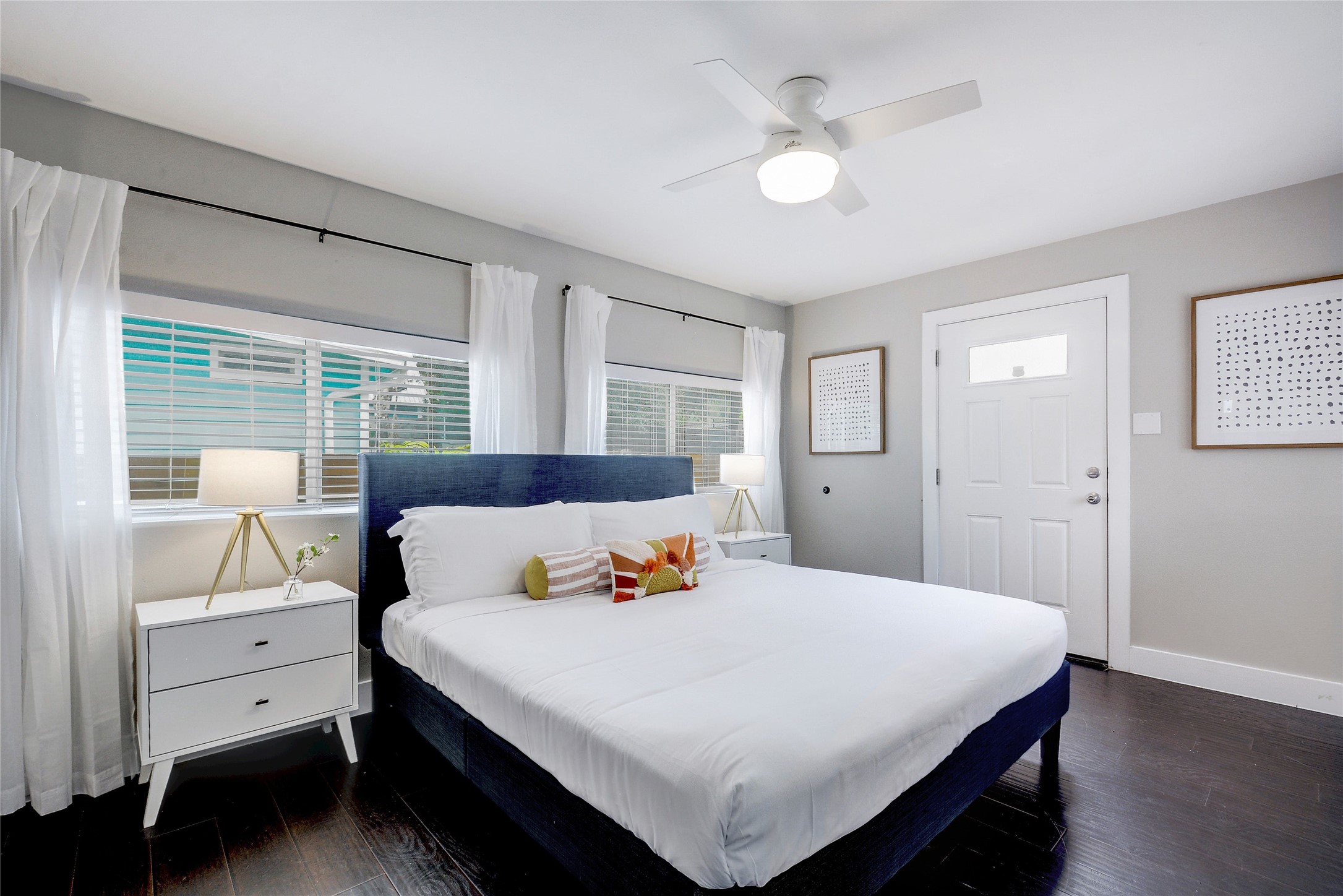 Undisclosed Address Austin, TX 78721 - Photo 13 of 35 Bedroom with dark wood finished floors and ceiling fan