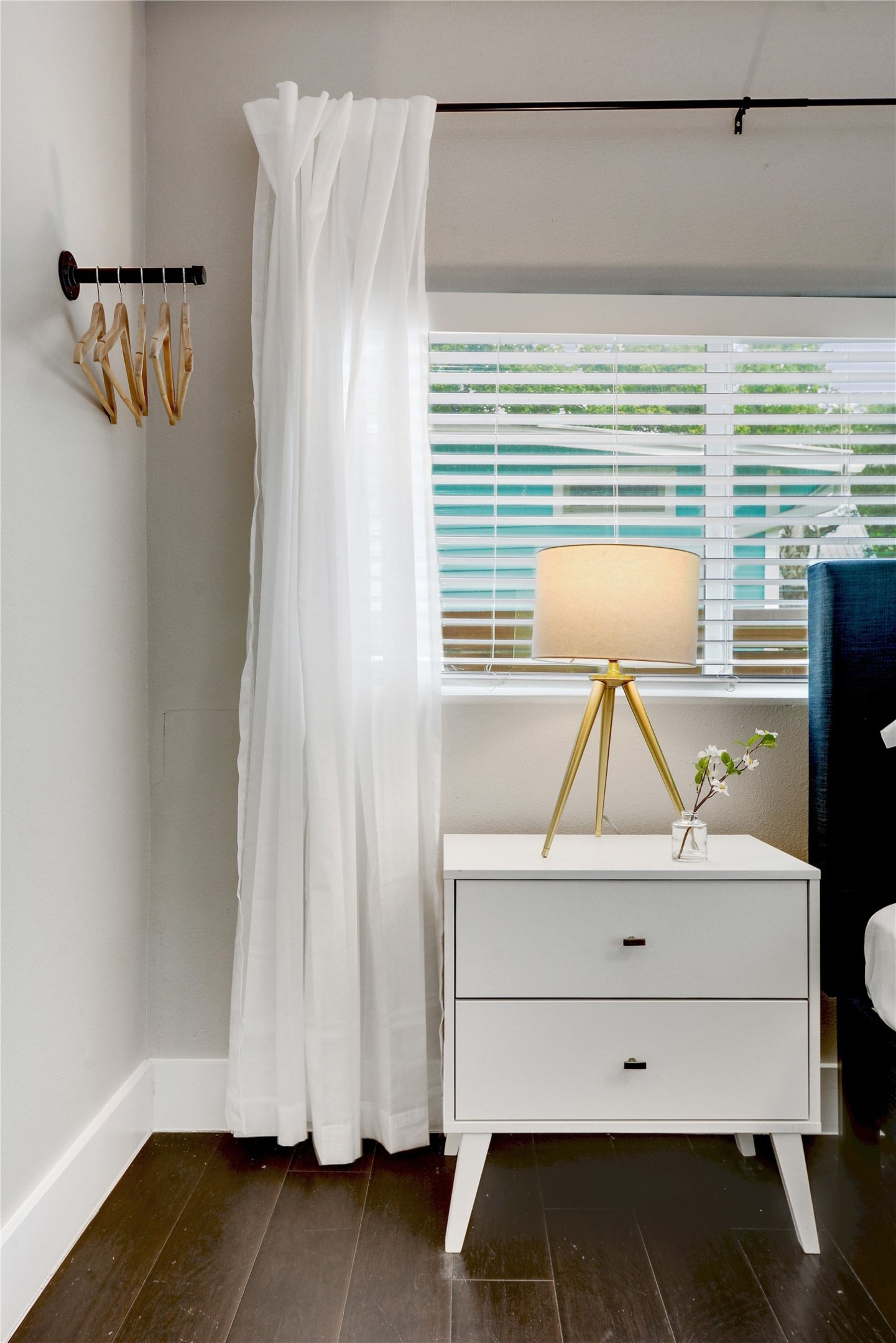 Undisclosed Address Austin, TX 78721 - Photo 16 of 35 Bedroom with dark wood finished floors