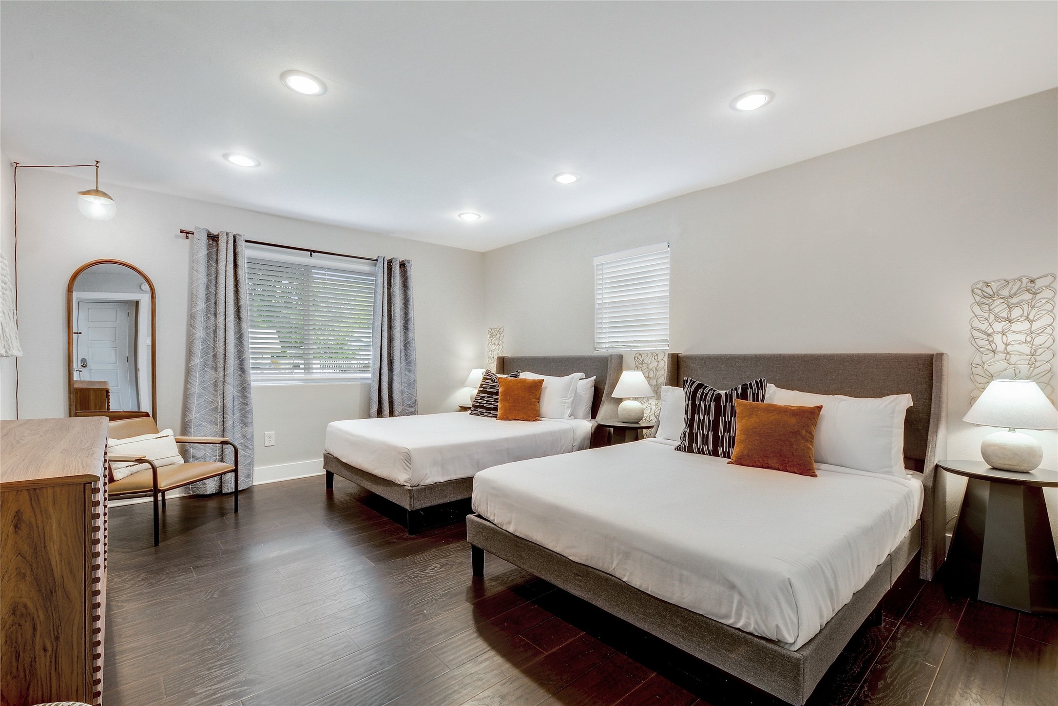 Undisclosed Address Austin, TX 78721 - Photo 17 of 35 Bedroom with dark wood finished floors and recessed lighting