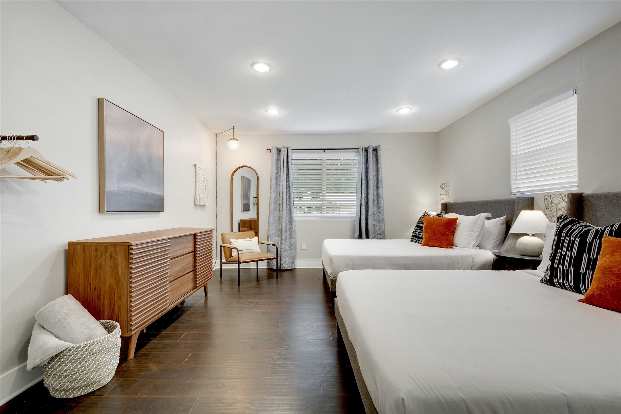 Undisclosed Address Austin, TX 78721 - Photo 19 of 35 Bedroom with dark wood finished floors and recessed lighting