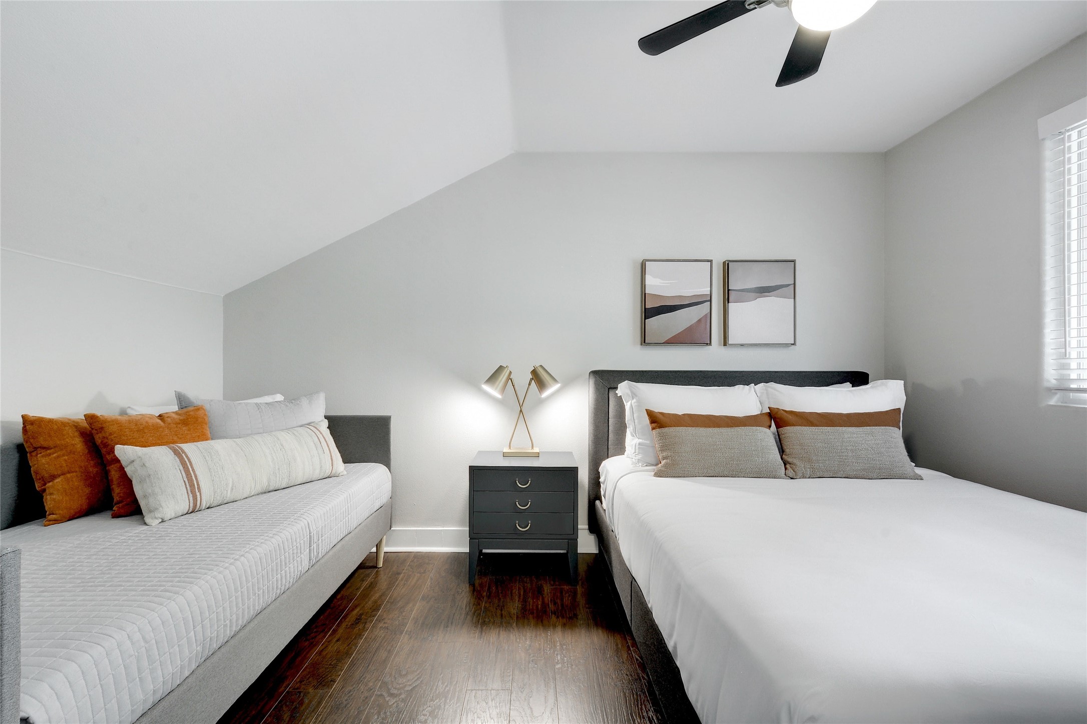 Undisclosed Address Austin, TX 78721 - Photo 24 of 35 Bedroom with dark wood finished floors, lofted ceiling, and ceiling fan