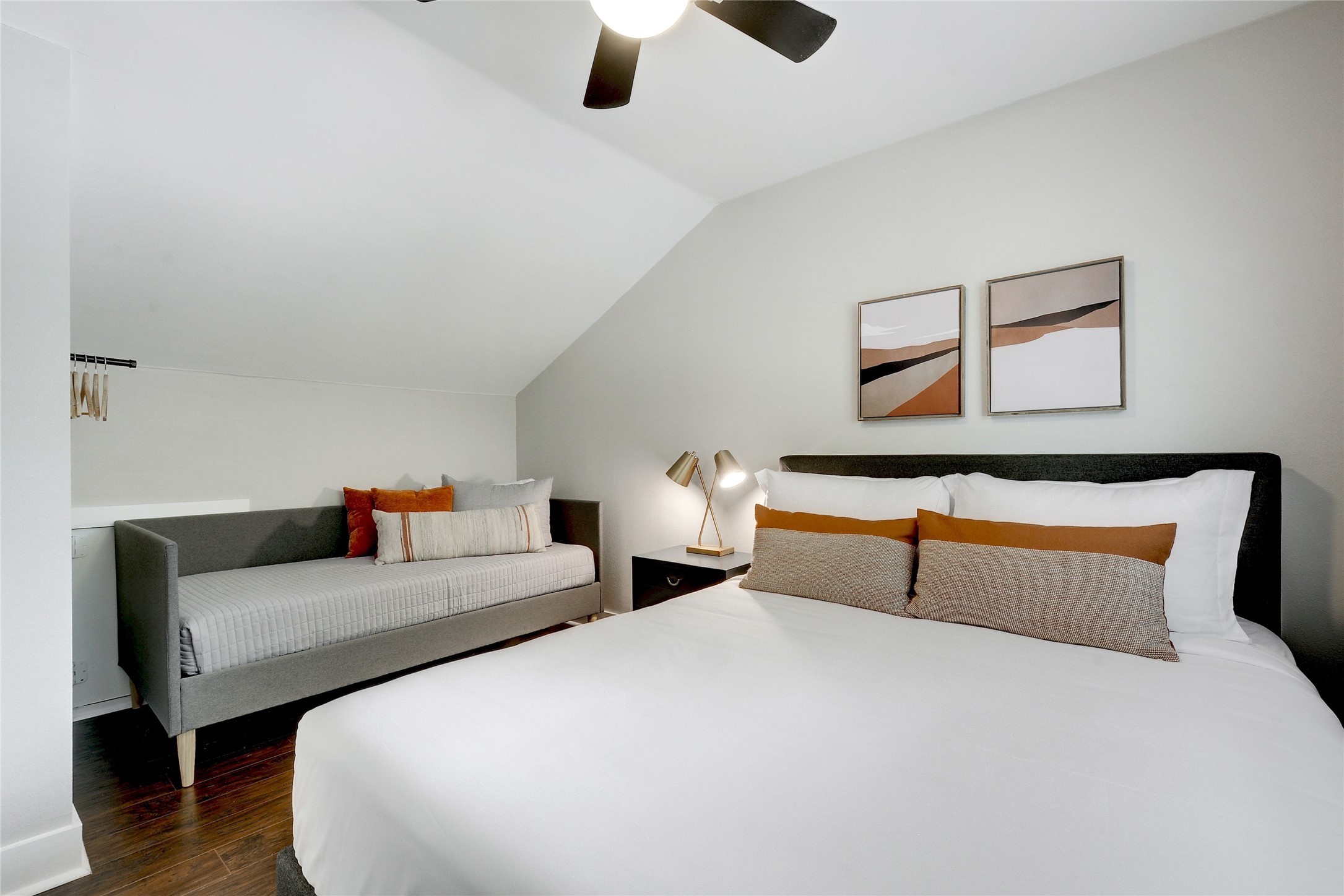 Undisclosed Address Austin, TX 78721 - Photo 25 of 35 Bedroom with lofted ceiling, a ceiling fan, and dark wood-type flooring