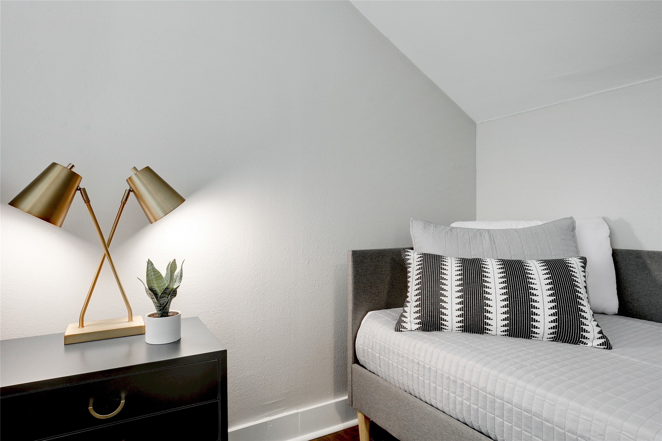 Undisclosed Address Austin, TX 78721 - Photo 30 of 35 Bedroom with wood finished floors and vaulted ceiling