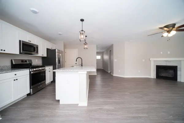 an empty room with a bathroom