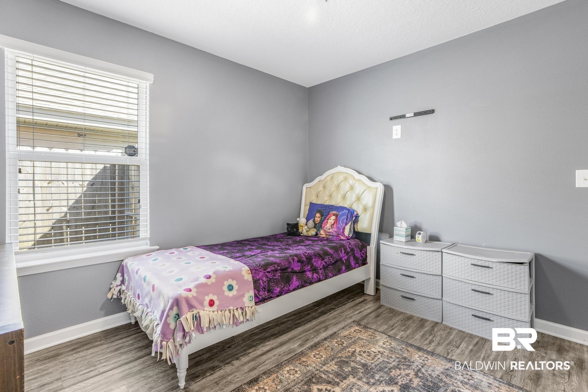 10738 Ridgeview Drive Mobile, AL 36608 - Photo 19 of 48 Bedroom featuring wood finished floors