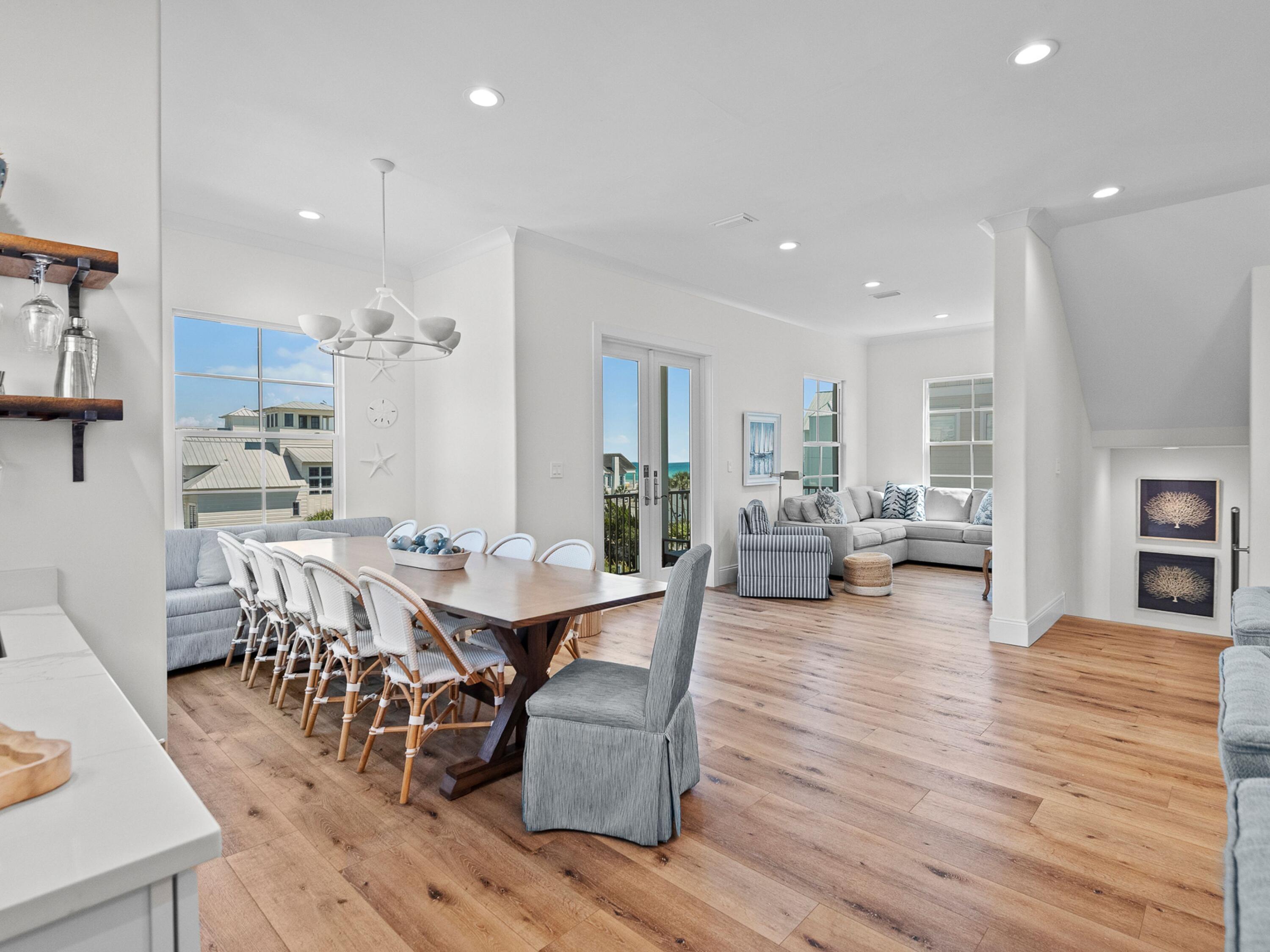50 Camelot Lane Santa Rosa Beach, FL 32459 - Photo 11 of 39 a view of a dining room with furniture and wooden floor