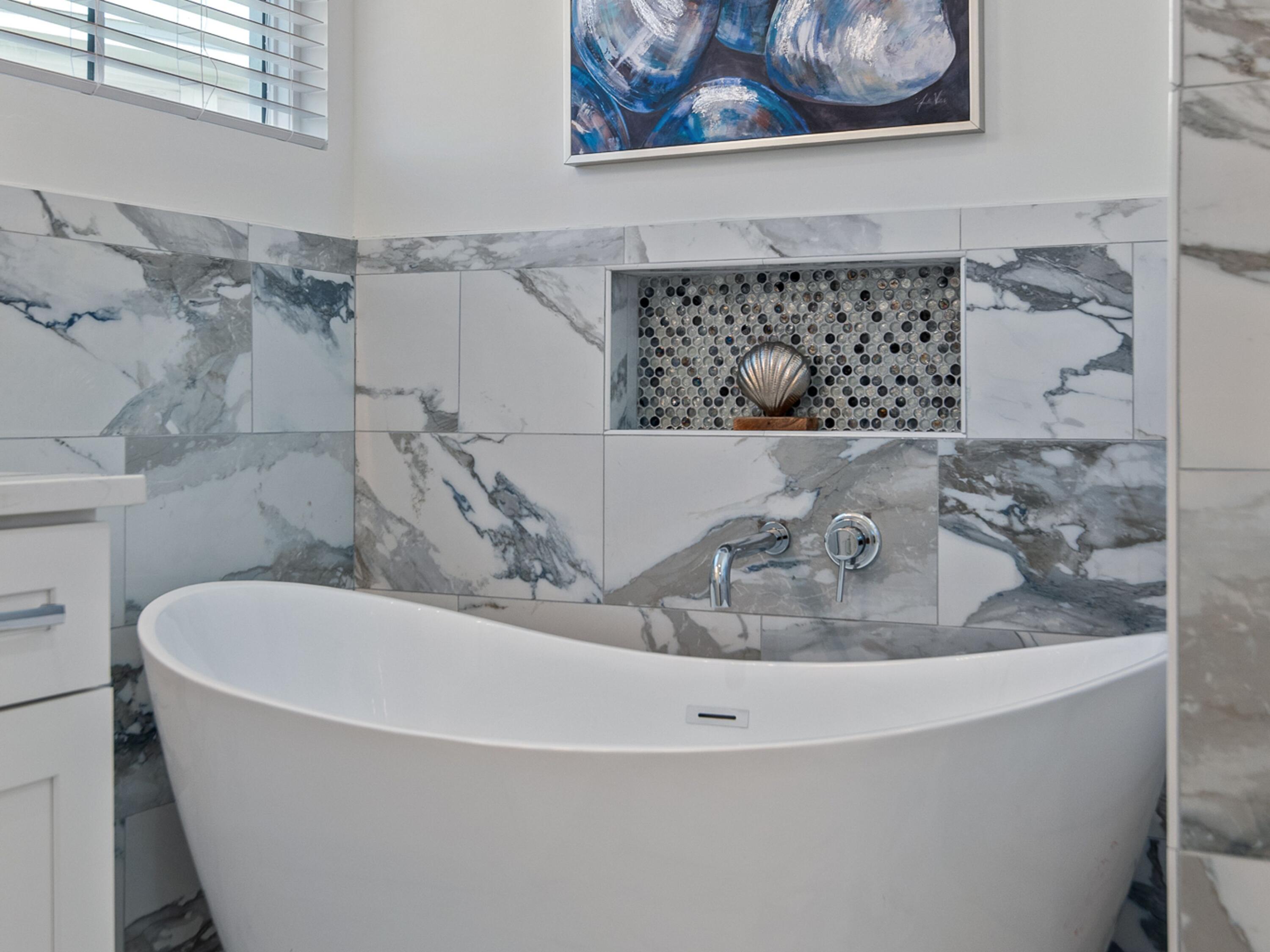 50 Camelot Lane Santa Rosa Beach, FL 32459 - Photo 17 of 39 a white bath tub sitting next to a white wall