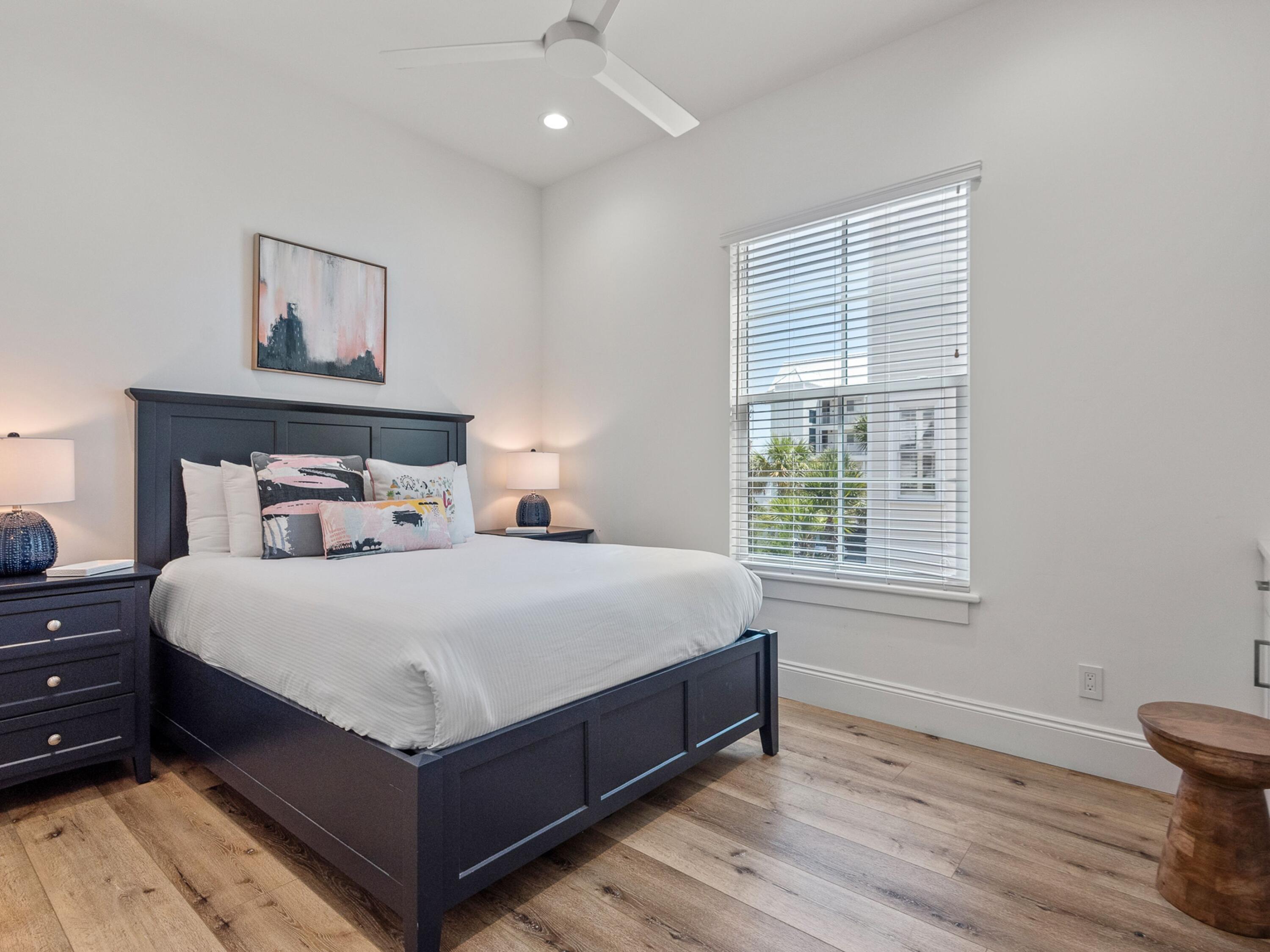 50 Camelot Lane Santa Rosa Beach, FL 32459 - Photo 22 of 39 a bed sitting in a bedroom next to a window