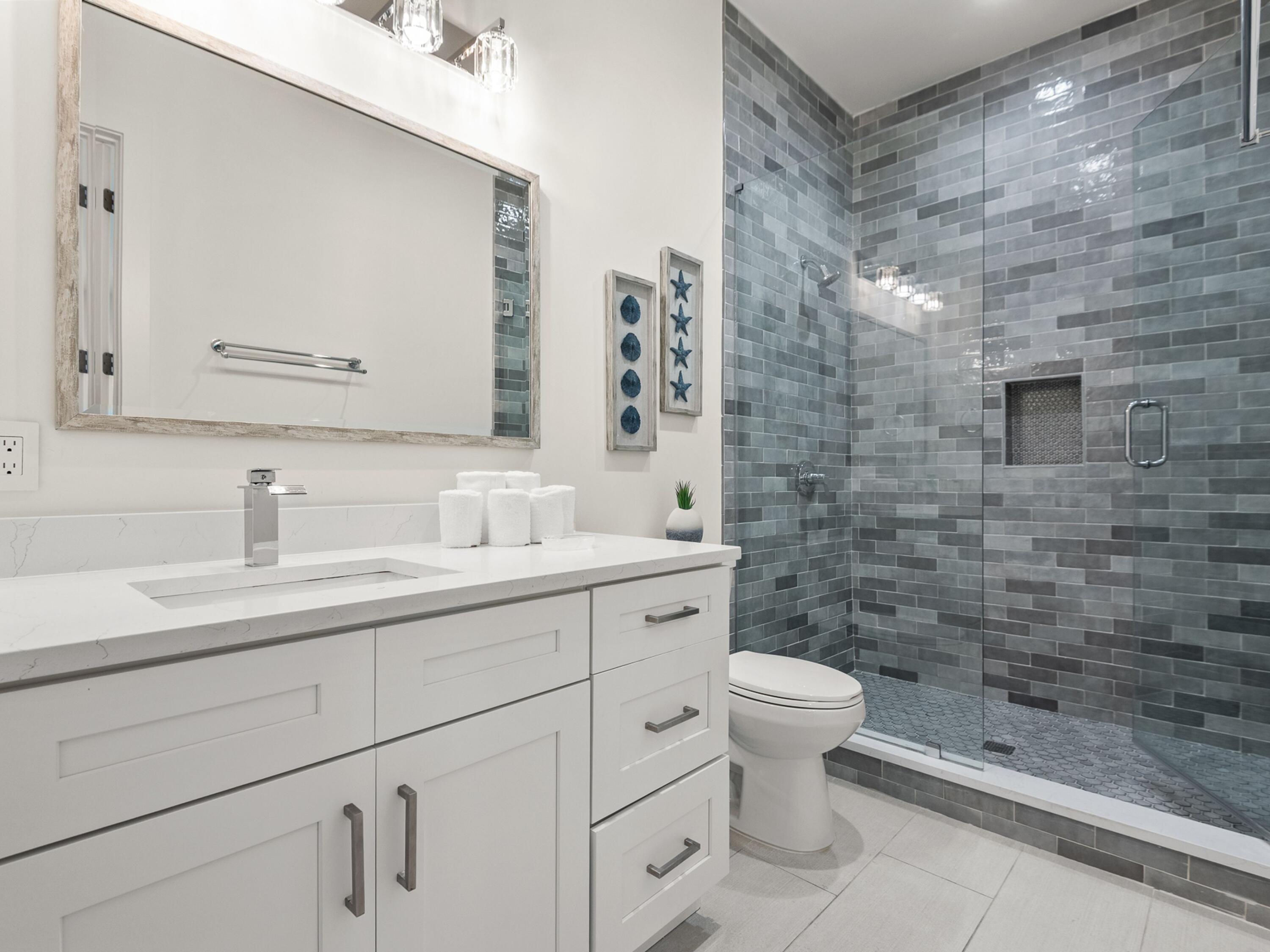 50 Camelot Lane Santa Rosa Beach, FL 32459 - Photo 27 of 39 a bathroom with a sink a toilet and shower
