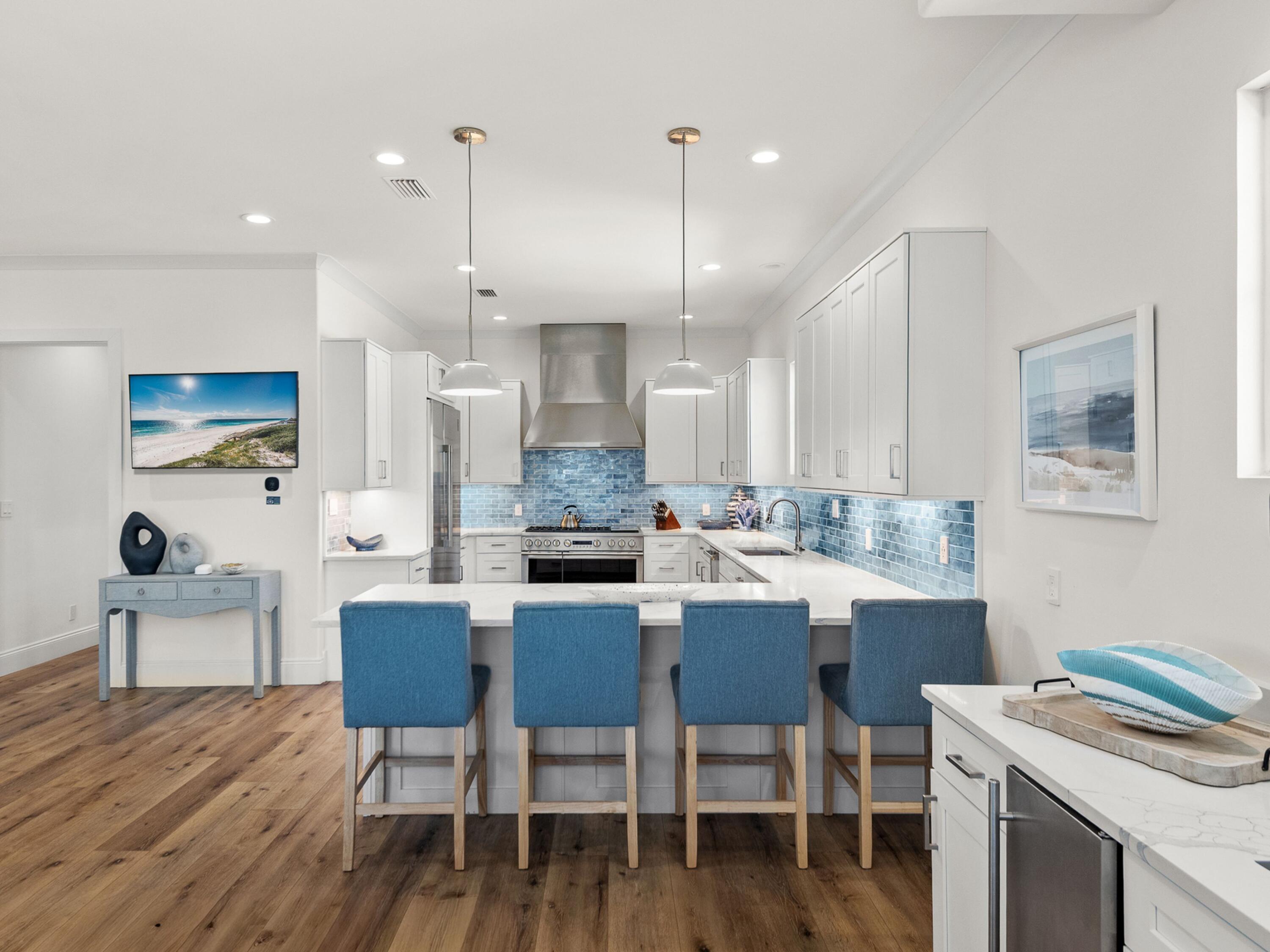 50 Camelot Lane Santa Rosa Beach, FL 32459 - Photo 5 of 39 a view of a dining room with furniture and wooden floor