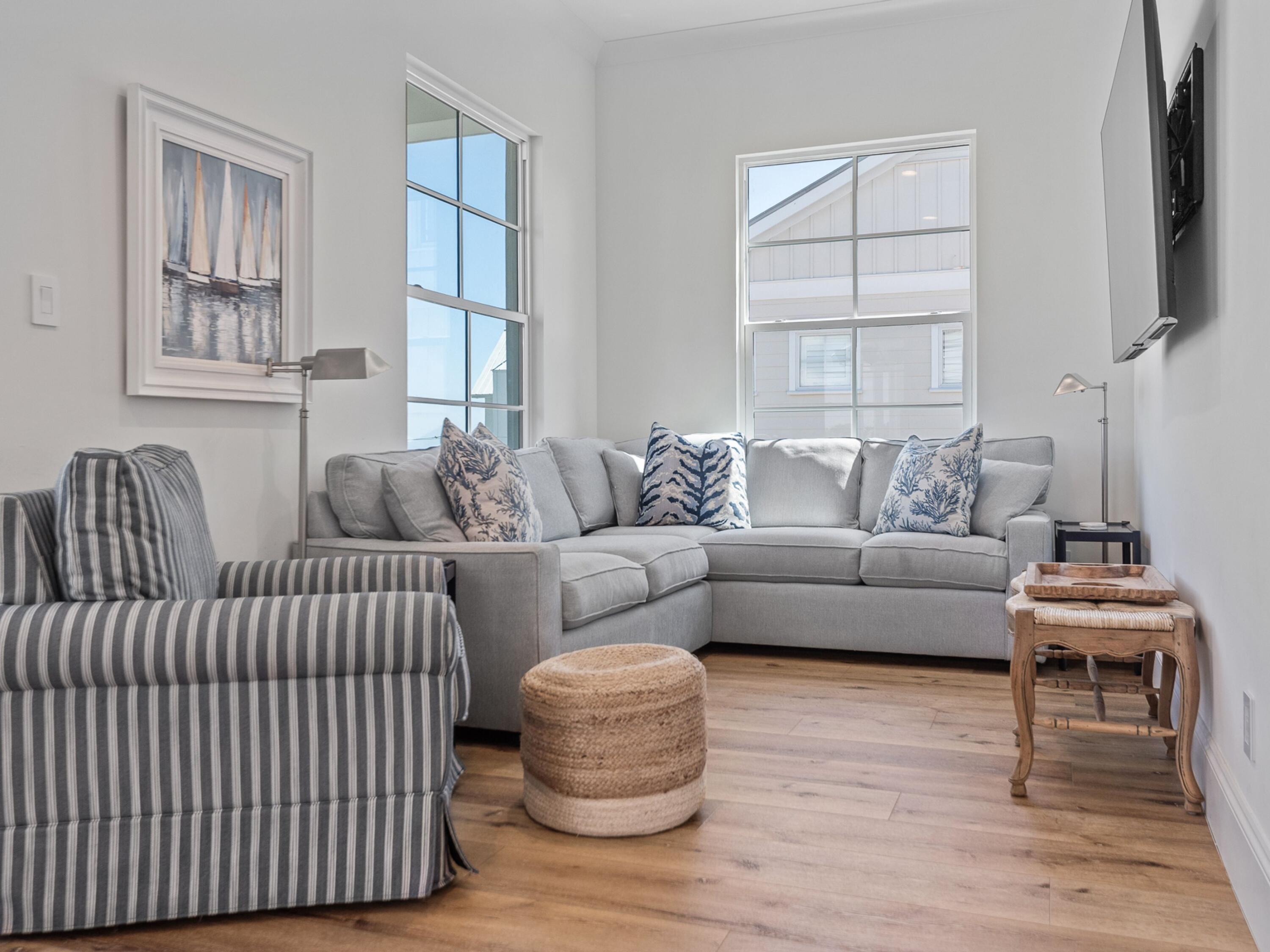 50 Camelot Lane Santa Rosa Beach, FL 32459 - Photo 9 of 39 a living room with furniture and a flat screen tv