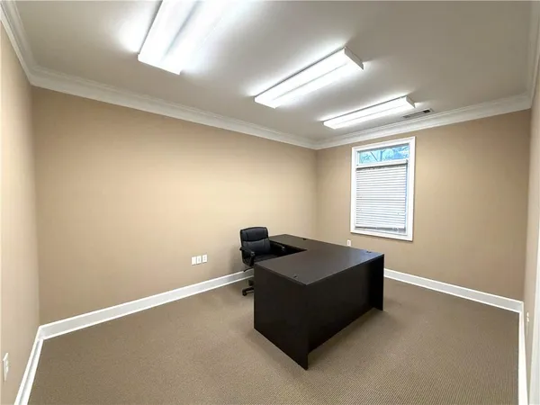 a room with furniture and window