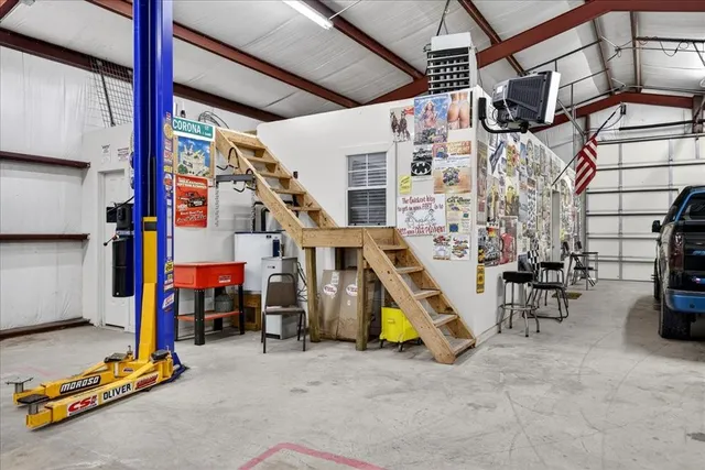 an aerial view of residential house with outdoor space