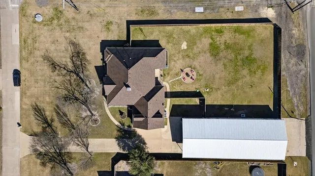 a living room with furniture a table and chairs
