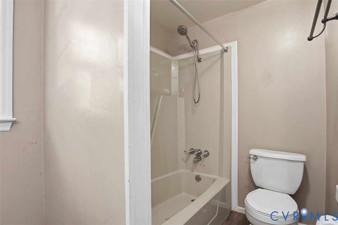 14527 Arwood Road Disputanta, VA 23842 - Photo 13 of 20 a bathroom with a toilet and shower
