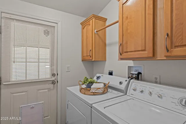 a bathroom with a sink and a window