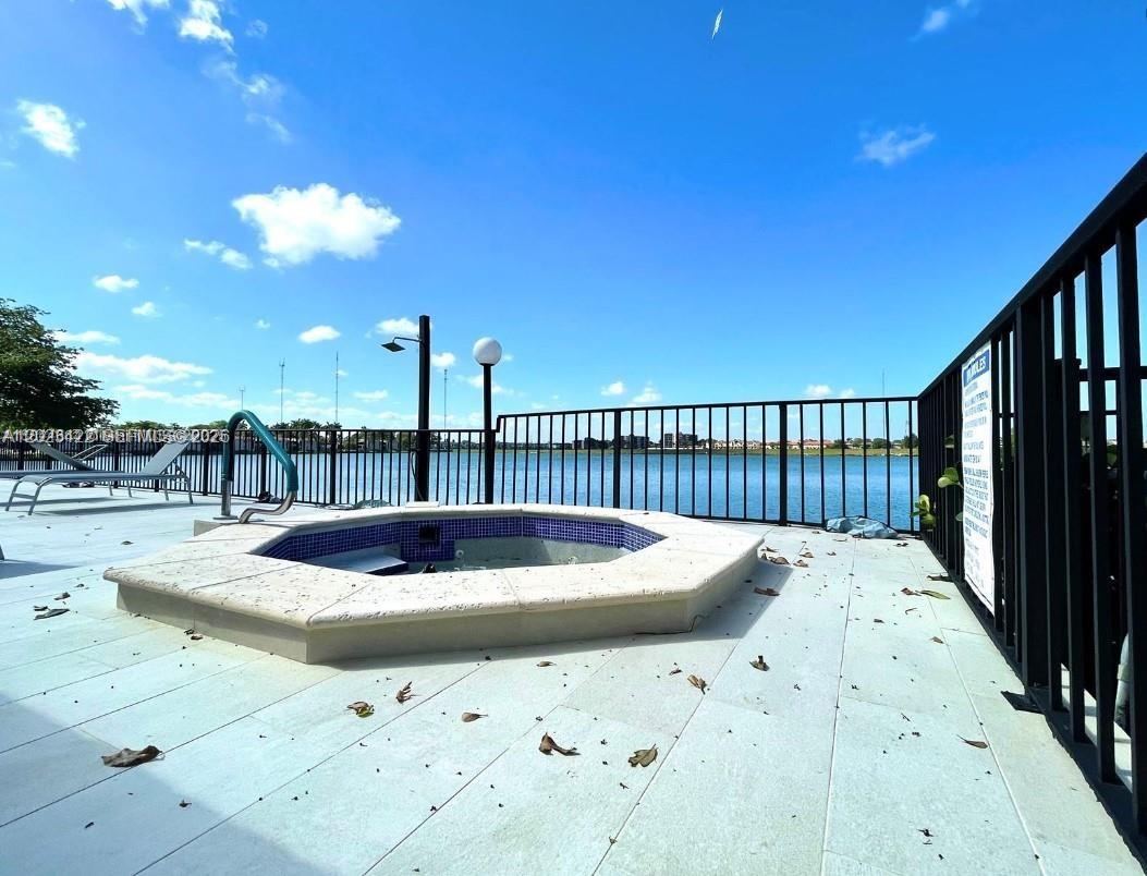 605 Ives Dairy Road, Unit 3067 Miami, FL 33179 - Photo 6 of 28 a dinning table with chairs