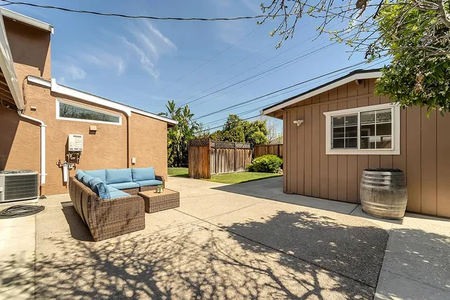 a outdoor space with patio furniture and a patio
